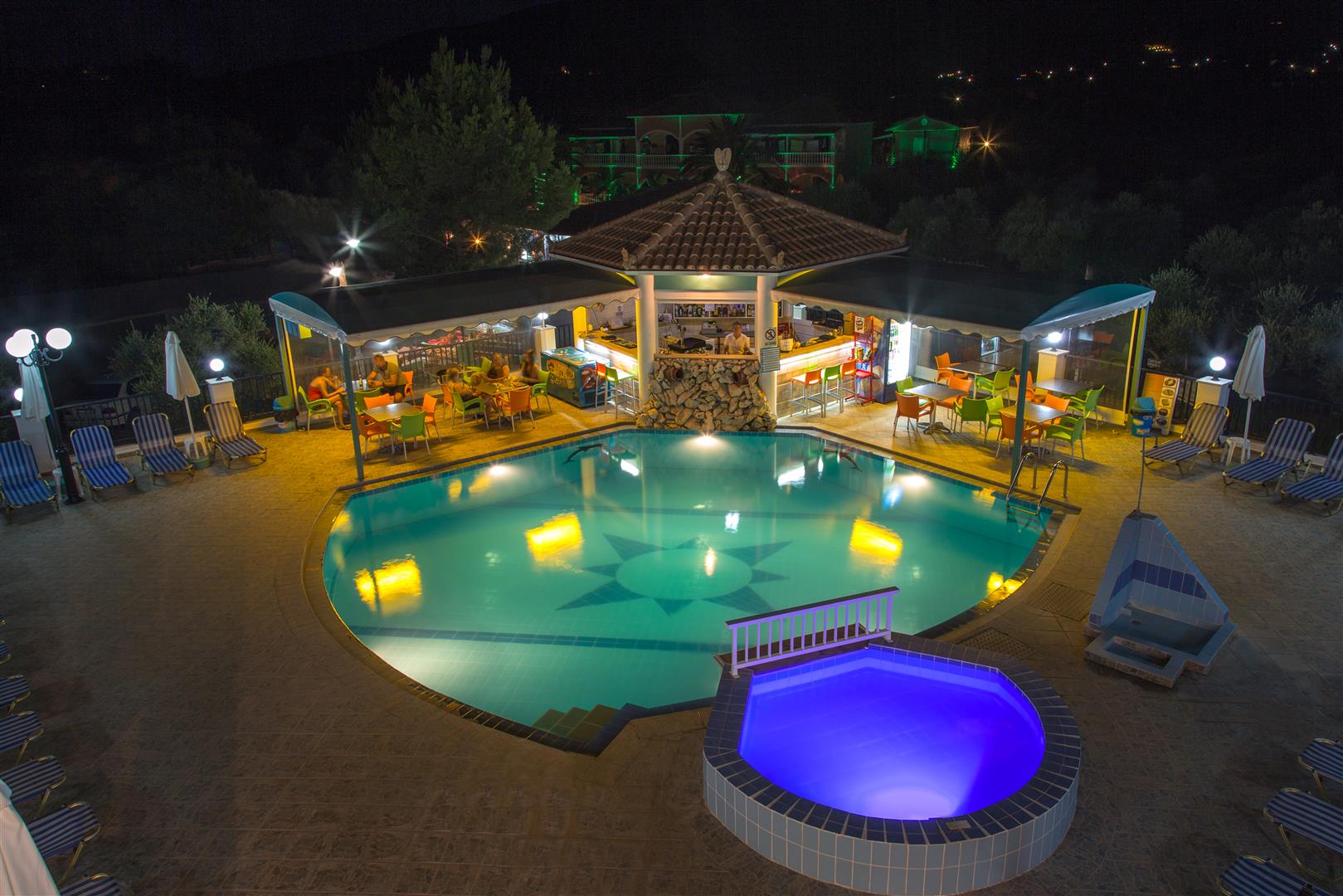BAR AND POOL VIEW NIGHT